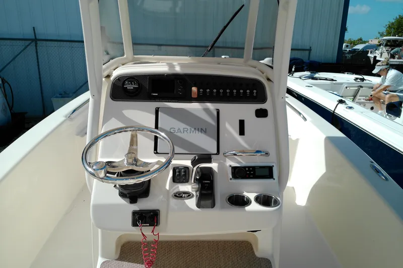 Slide: The Image of 2015 Grady-White 251 Coastal Explorer boat console with Garmin navigation system. - 12