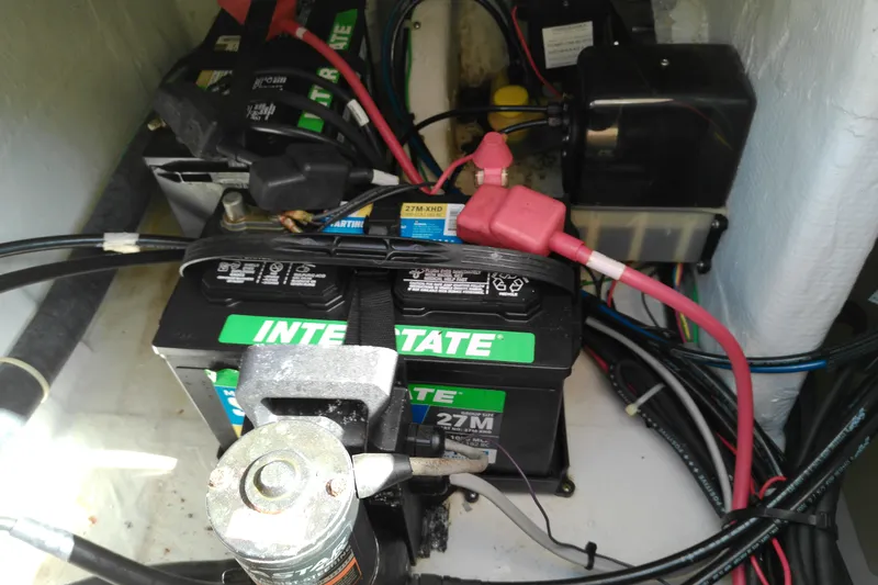 Slide: The Image of Battery compartment of 2015 Grady-White 251 Coastal Explorer boat with Interstate batteries. - 16