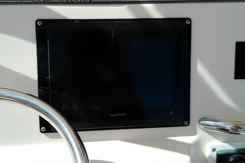 Slide: The Image of Garmin display on 2015 Grady-White 251 Coastal Explorer boat dashboard. - 20