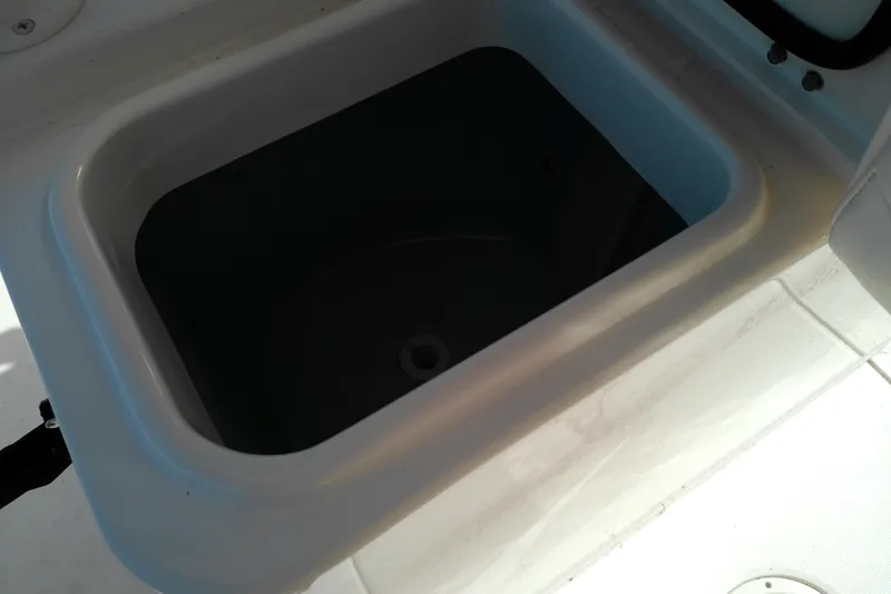Slide: The Image of Livewell compartment on a 2015 Grady-White 251 Coastal Explorer boat. - 24