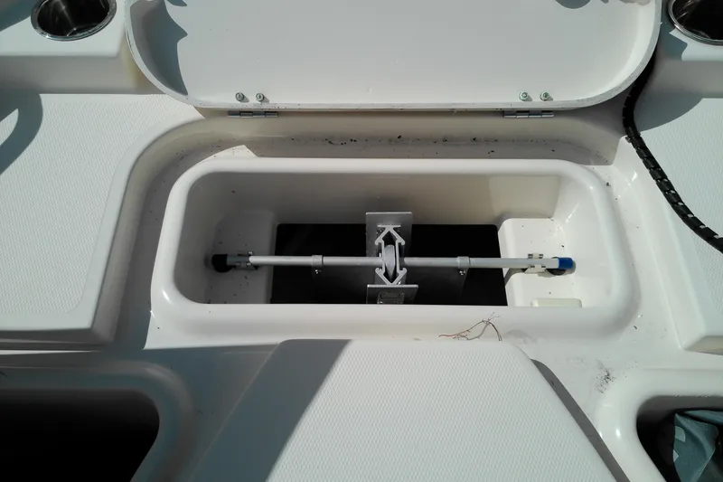 Slide: The Image of Storage compartment of 2015 Grady-White 251 Coastal Explorer boat, open lid view. - 33