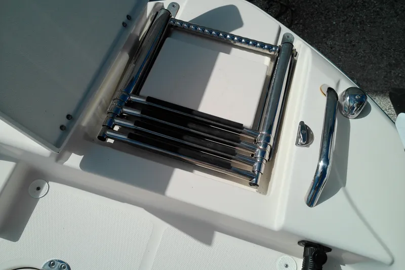 Slide: The Image of Foldable ladder on 2015 Grady-White 251 Coastal Explorer boat deck. - 35