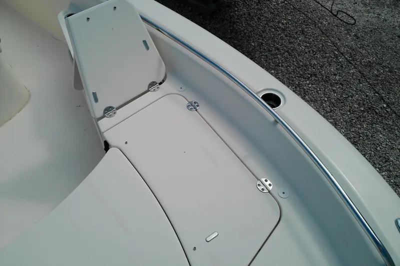 Slide: The Image of 2015 Grady-White 251 Coastal Explorer boat deck with storage compartments. - 39