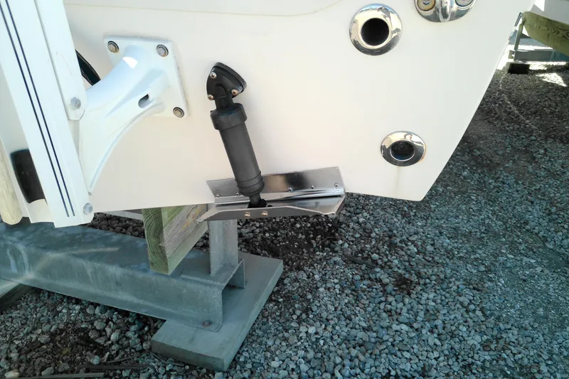 Slide: The Image of 2015 Grady-White 251 Coastal Explorer boat detail on gravel surface. - 8