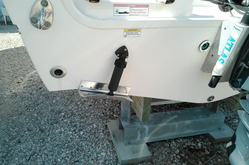 Slide: The Image of 2015 Grady-White 251 Coastal Explorer boat transom with hydraulic components. - 9