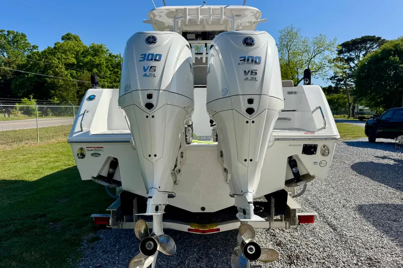 Slide: The Image of 2024 Sea Hunt Gamefish 28 Coffin Box with dual 300 V6 outboard engines. - 5
