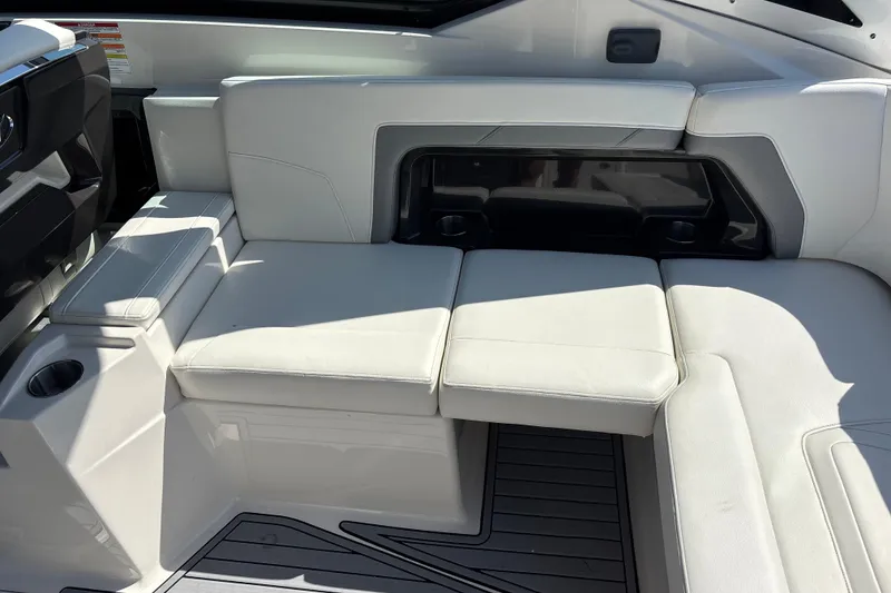 Slide: The Image of Luxurious seating area on a 2014 Monterey 328SS Super Sport boat. - 9