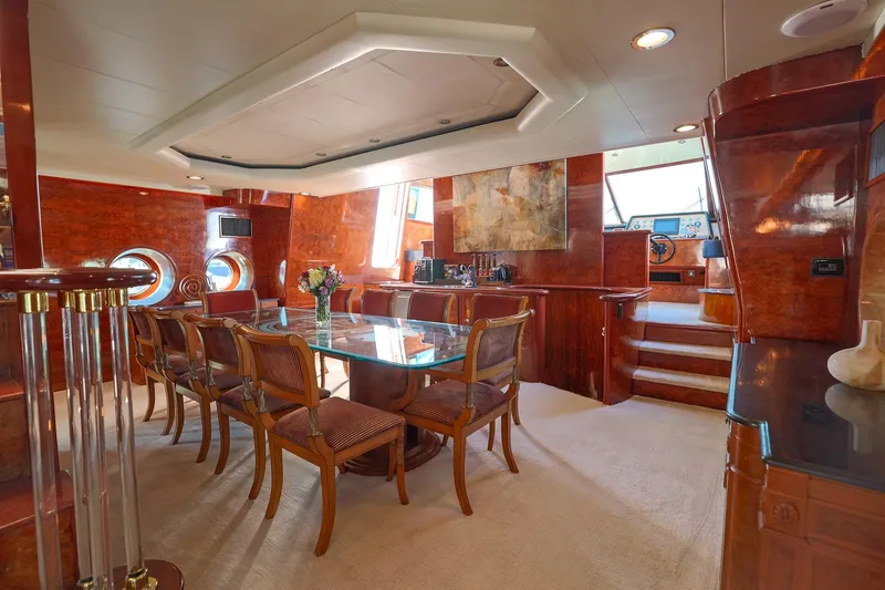 Slide: The Image of Luxurious interior of 1996 Monte Fino Eurostyle yacht with elegant dining area. - 10