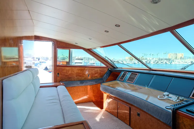 Slide: The Image of Luxurious interior of 1996 Monte Fino Eurostyle yacht with panoramic marina view. - 12