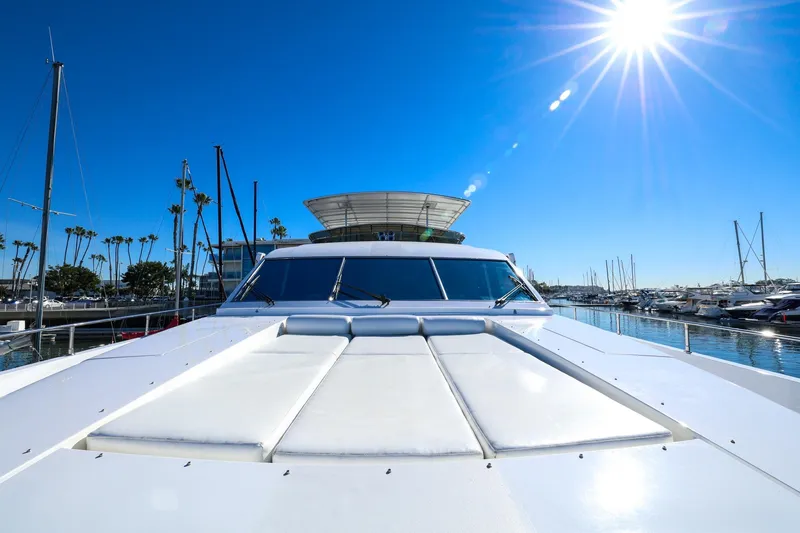 Slide: The Image of Monte Fino Eurostyle 1996 yacht docked under bright sun, marina view. - 7