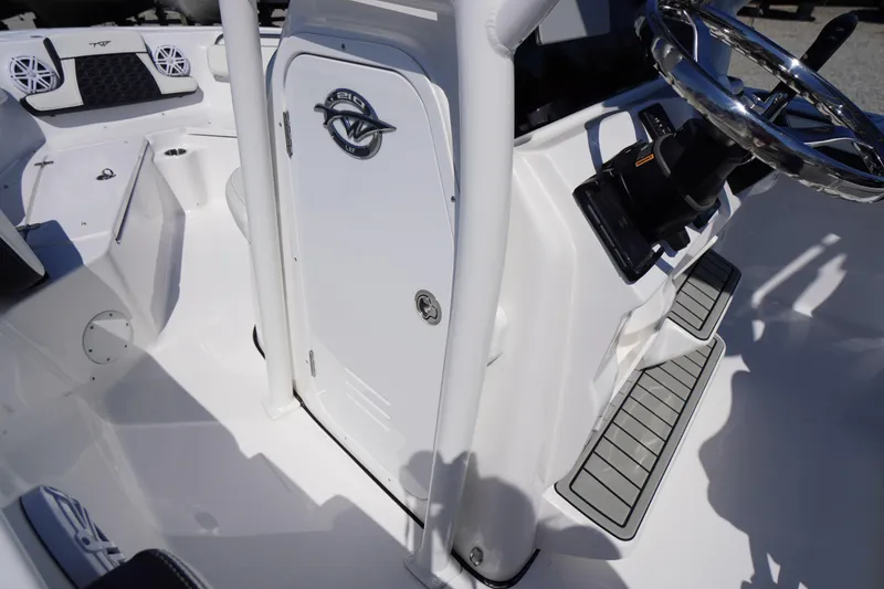 Slide: The Image of 2025 Tidewater 210 LXF boat interior with steering wheel and console details. - 17