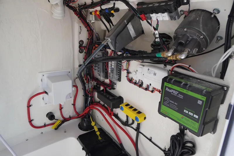 Slide: The Image of Electrical system of a 2025 Tidewater 210 LXF boat, showcasing wiring and components. - 19