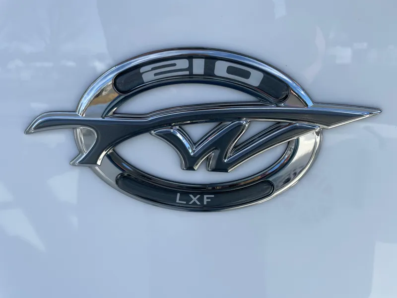 Slide: The Image of 2024 Tidewater 210 LXF logo emblem on white background. - 3