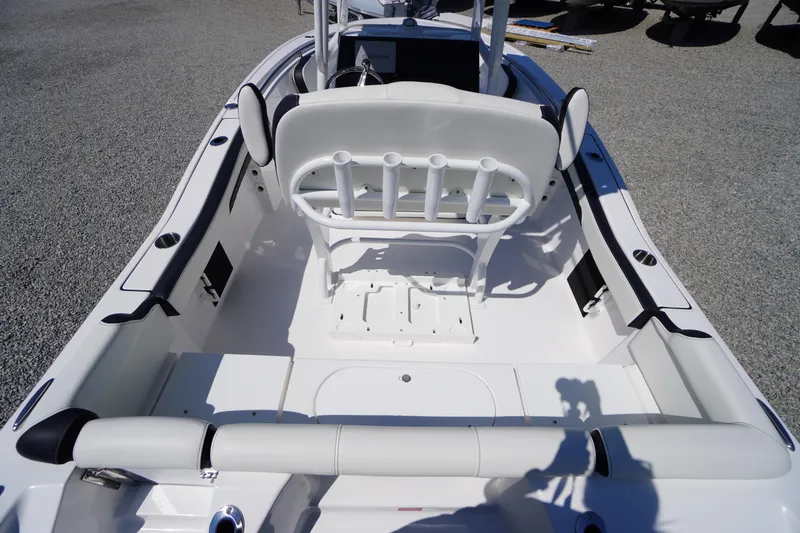 Slide: The Image of 2025 Tidewater 210 LXF boat interior with seating and rod holders, showcasing sleek design. - 32