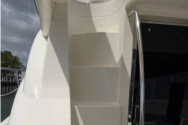 Slide: The Image of Close-up of 2004 Azimut 39E yacht's sleek exterior design with chrome railing. - 9