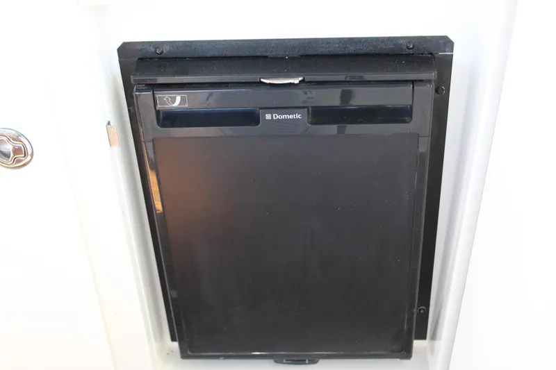 Slide: The Image of Dometic refrigerator on 2011 Sea Ray Sundancer 350 yacht interior. - 10