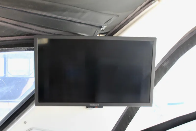 Slide: The Image of Flat-screen TV mounted inside a 2011 Sea Ray Sundancer 350 boat. - 11
