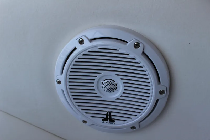 Slide: The Image of White JL Audio speaker on 2011 Sea Ray Sundancer 350 boat interior wall. - 12