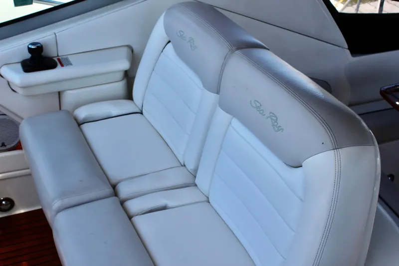 Slide: The Image of Luxurious white seating on 2011 Sea Ray Sundancer 350 yacht interior. - 22