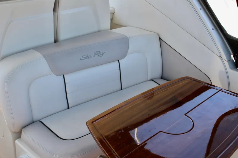Slide: The Image of Luxurious seating and table on 2011 Sea Ray Sundancer 350 yacht interior. - 8