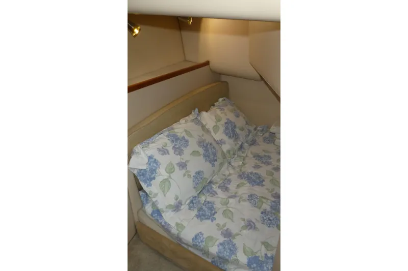 Slide: The Image of Cozy cabin bed with floral bedding in 2003 Meridian 341 Sedan yacht. - 18