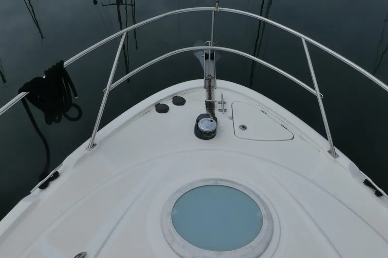 Slide: The Image of Bow of 2003 Meridian 341 Sedan yacht with railing and anchor. - 22