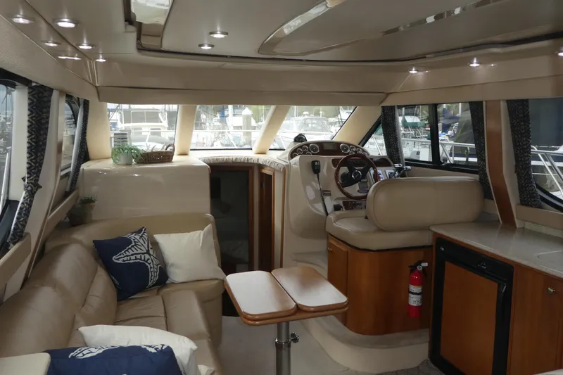 Slide: The Image of Luxurious interior of a 2003 Meridian 341 Sedan yacht with plush seating and elegant design. - 3