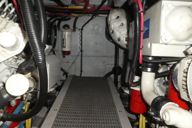 Slide: The Image of Engine room of a 2003 Meridian 341 Sedan with visible components and wiring. - 31