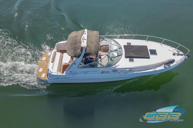 Slide: The Image of Aerial view of 2000 Sea Ray 340 Sundancer cruising on calm water. - 25