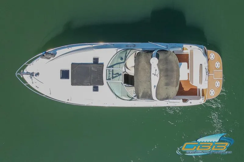 Slide: The Image of Overhead view of 2000 Sea Ray 340 Sundancer yacht on calm water. - 30