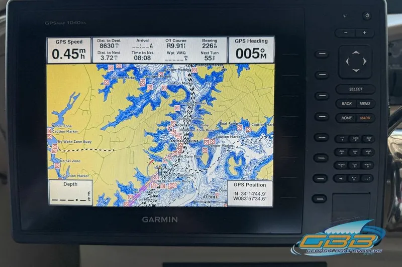 Slide: The Image of Garmin GPS display on 2000 Sea Ray 340 Sundancer, showing navigation map and speed. - 36
