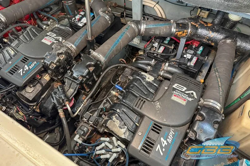 Slide: The Image of Engine compartment of a 2000 Sea Ray 340 Sundancer with twin 7.4 MPI V8 engines. - 4