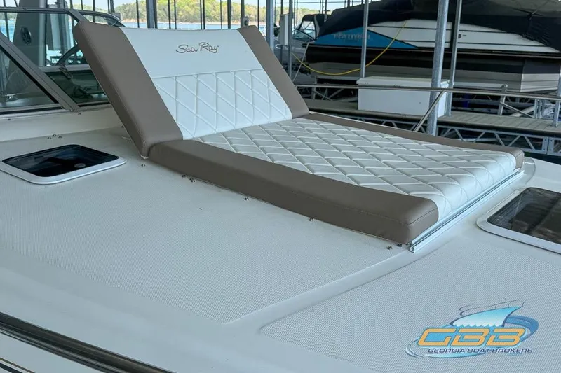 Slide: The Image of Sunpad on 2000 Sea Ray 340 Sundancer boat, featuring quilted design and Georgia Boat Brokers logo. - 41