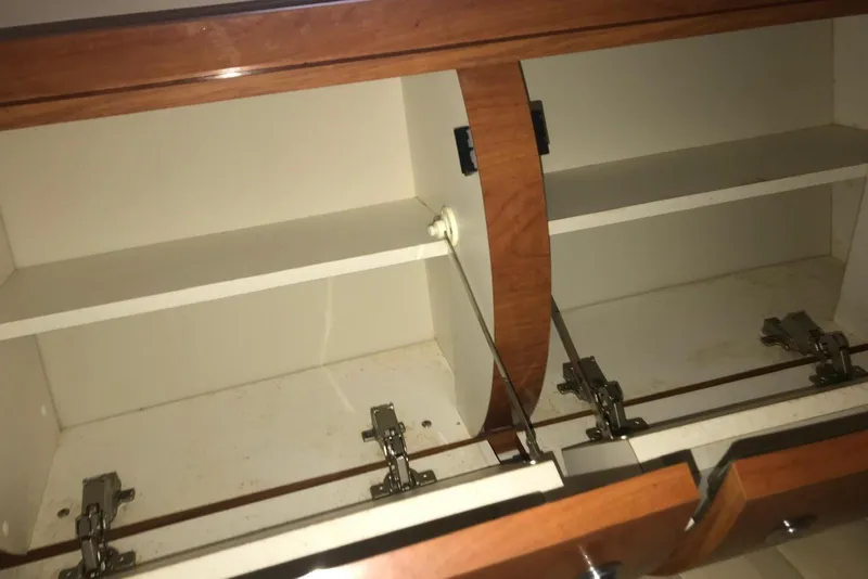 Slide: The Image of Open wooden cabinet with shelves and hinges, Doral Intrigue 2007 model. - 45