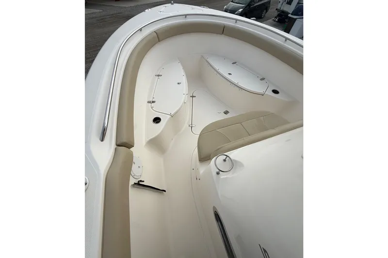 Slide: The Image of 2016 Pursuit S 280 Sport boat interior with seating and storage compartments. - 25