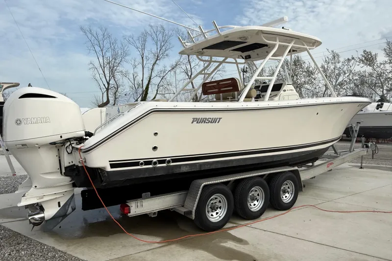 Slide: The Image of 2016 Pursuit S 280 Sport boat on trailer with Yamaha outboard engines. - 8