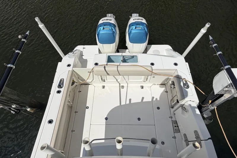 Slide: The Image of Overhead view of 2016 Boston Whaler 330 Outrage boat with dual engines. - 19