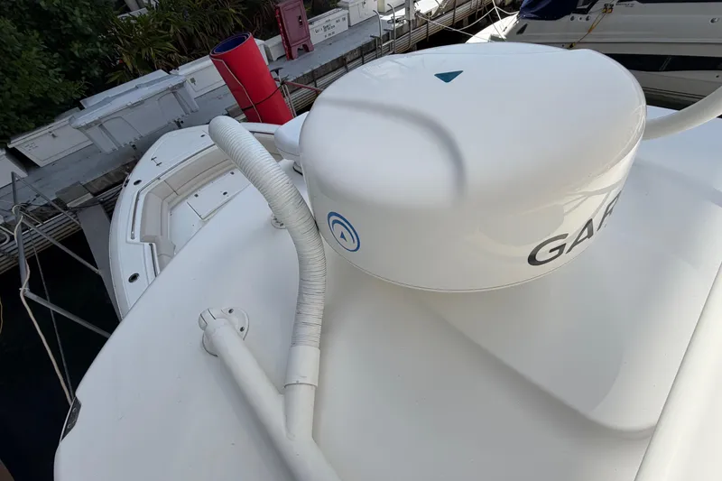 Slide: The Image of 2016 Boston Whaler 330 Outrage with Garmin radar system on deck. - 20