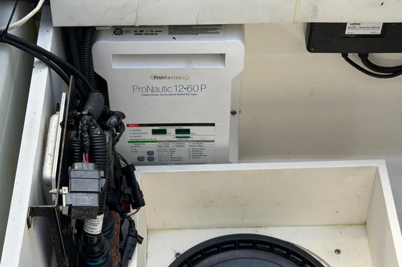 Slide: The Image of Electrical system of a 2016 Boston Whaler 330 Outrage featuring ProMariner ProNautic 12-60P charger. - 26