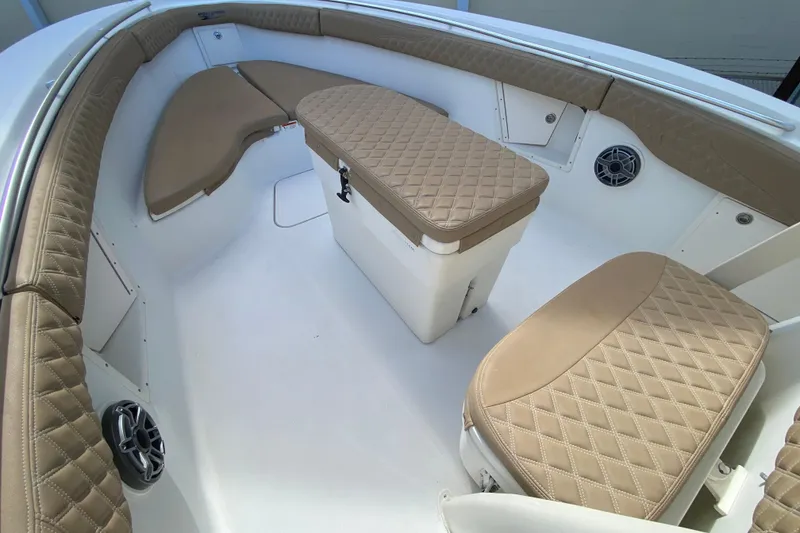 Slide: The Image of 2006 Hydra-Sports Vector 3300 CC boat interior with tan quilted seating and storage. - 33