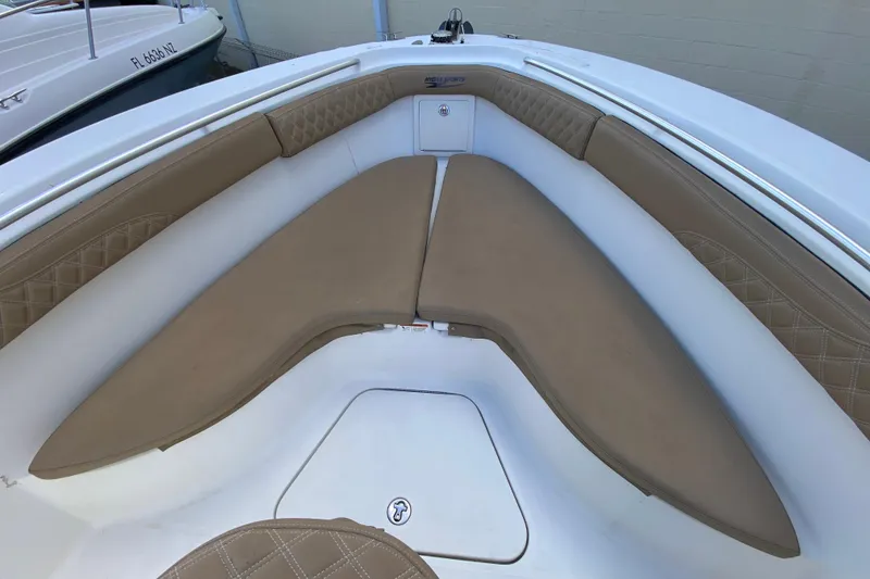 Slide: The Image of 2006 Hydra-Sports Vector 3300 CC boat interior with tan cushioned seating. - 35