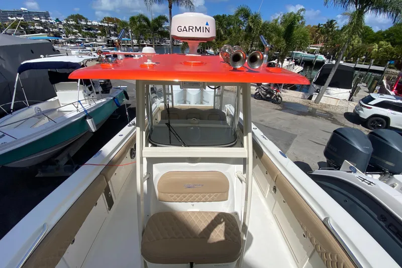 Slide: The Image of 2006 Hydra-Sports Vector 3300 CC boat with Garmin equipment, docked at a marina. - 40