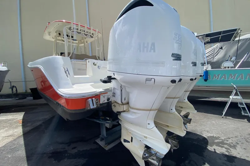 Slide: The Image of 2006 Hydra-Sports Vector 3300 CC boat with Yamaha outboard engines, docked outdoors. - 47