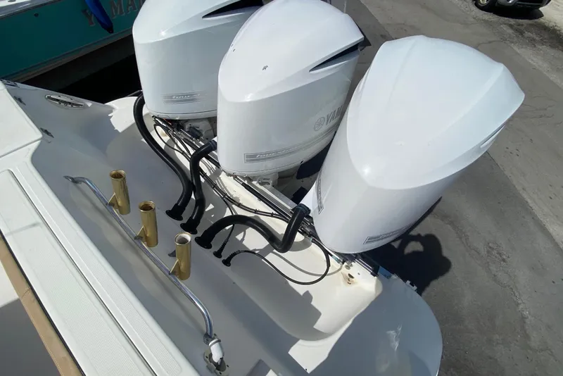 Slide: The Image of 2006 Hydra-Sports Vector 3300 CC with three Yamaha outboard engines. - 49