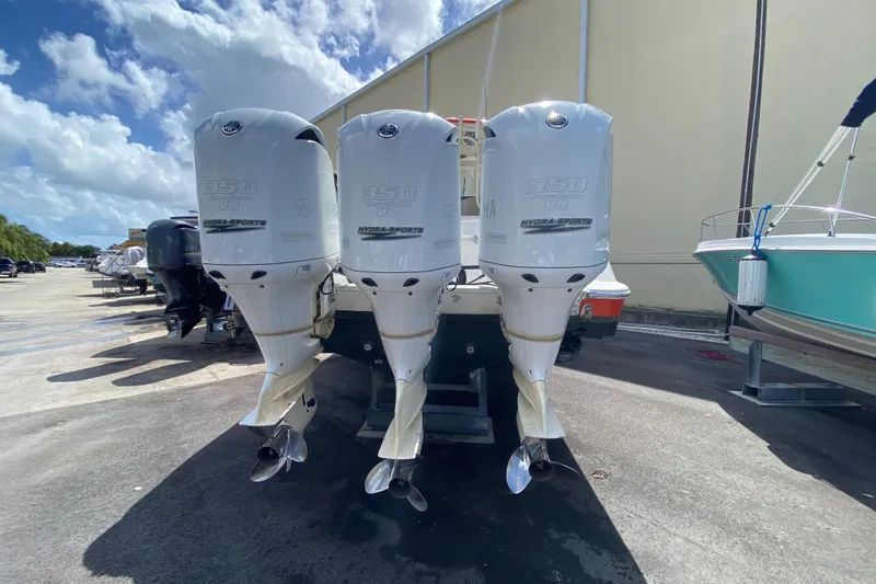 Slide: The Image of 2006 Hydra-Sports Vector 3300 CC with triple 350 HP engines, docked outdoors. - 50