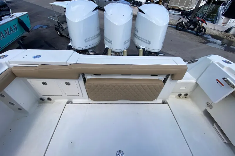 Slide: The Image of 2006 Hydra-Sports Vector 3300 CC boat with triple Yamaha outboard engines. - 54