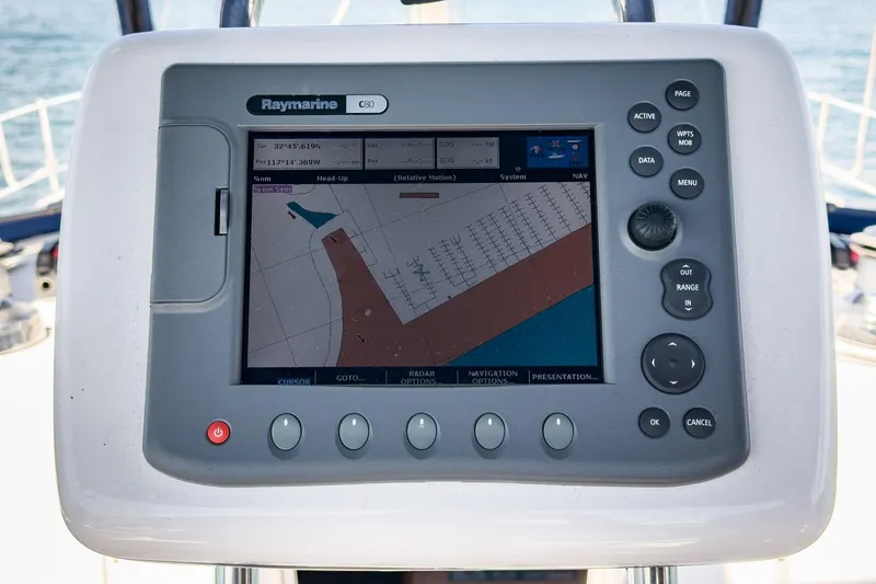 Slide: The Image of Raymarine C80 navigation system on 2007 Hunter 38 sailboat, displaying nautical chart. - 17