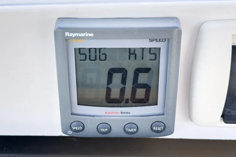 Slide: The Image of Raymarine speed display showing 0.6 knots on a 2007 Hunter 38 sailboat. - 19