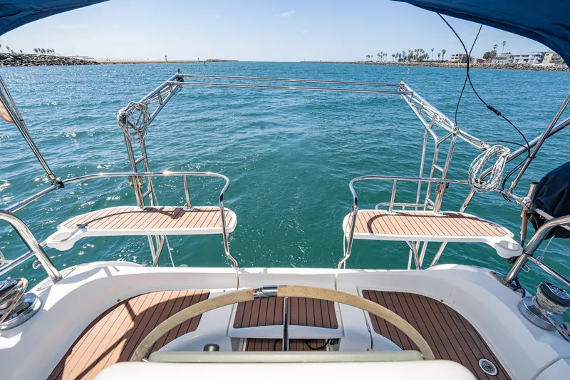 Slide: The Image of Sailboat deck view of ocean, Hunter 38 model, 2007, with clear blue water. - 22