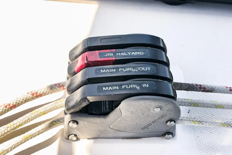 Slide: The Image of Sailboat control levers labeled for jib and main furling on a 2007 Hunter 38. - 26